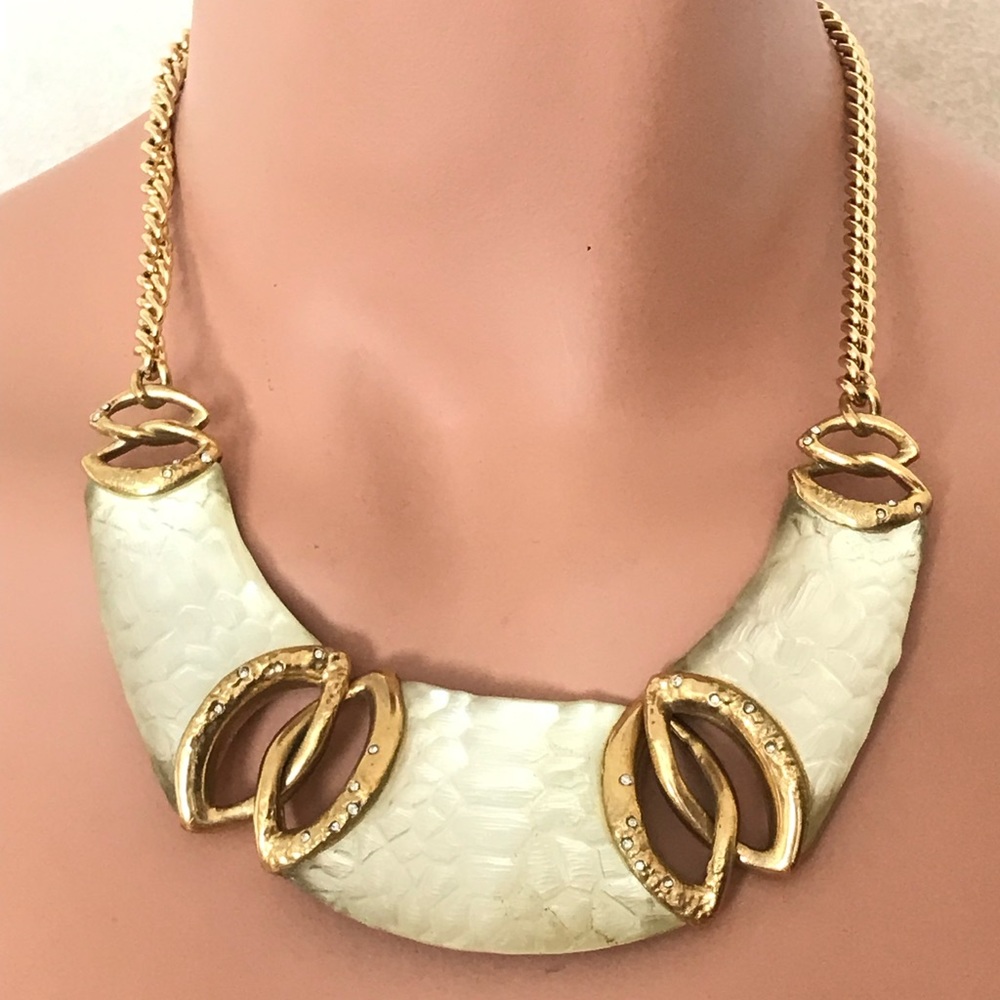 Alexis Bittar champagne reptile lucite necklace w/crystals in gold tone setting.